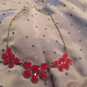 Red statement necklace and earrings